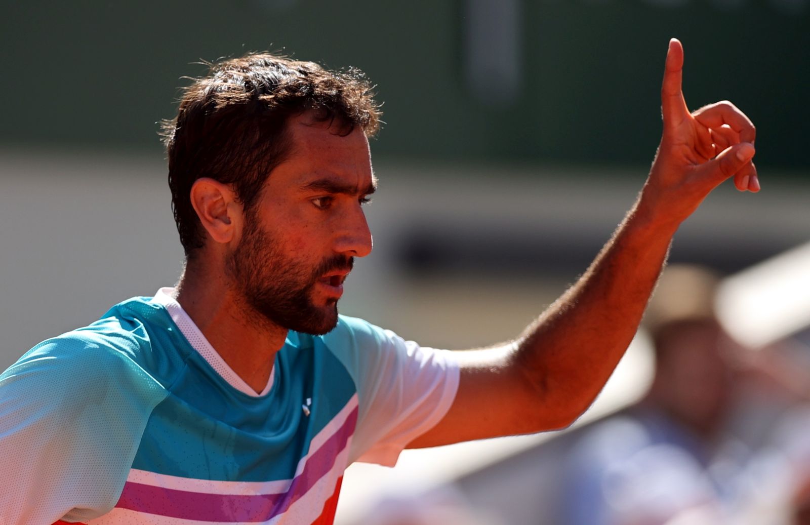 epa09989882 Marin Cilic of Croatia reacts as he plays Andrey Rublev of Russia in their men’s quarterfinal match during the French Open tennis tournament at Roland ​Garros in Paris, France, 01 June 2022.  EPA/MARTIN DIVISEK