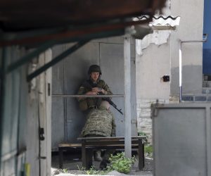 epa10001993 A Ukrainian servicemen rests close to their position in Novoluhanske, Donetsk area, Ukraine, 08 June 2022. Russian troops on 24 February entered Ukrainian territory, starting a conflict that has provoked destruction and a humanitarian crisis.  EPA/STRINGER