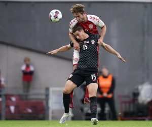 epa10006639 Croatia's Mario Pasalic and Denmark's Joachim Andersen (top) in action during the UEFA Nations League soccer match between Denmark and Croatia in Copenhagen, Denmark, 10 June 2022.  EPA/Liselotte Sabroe  DENMARK OUT