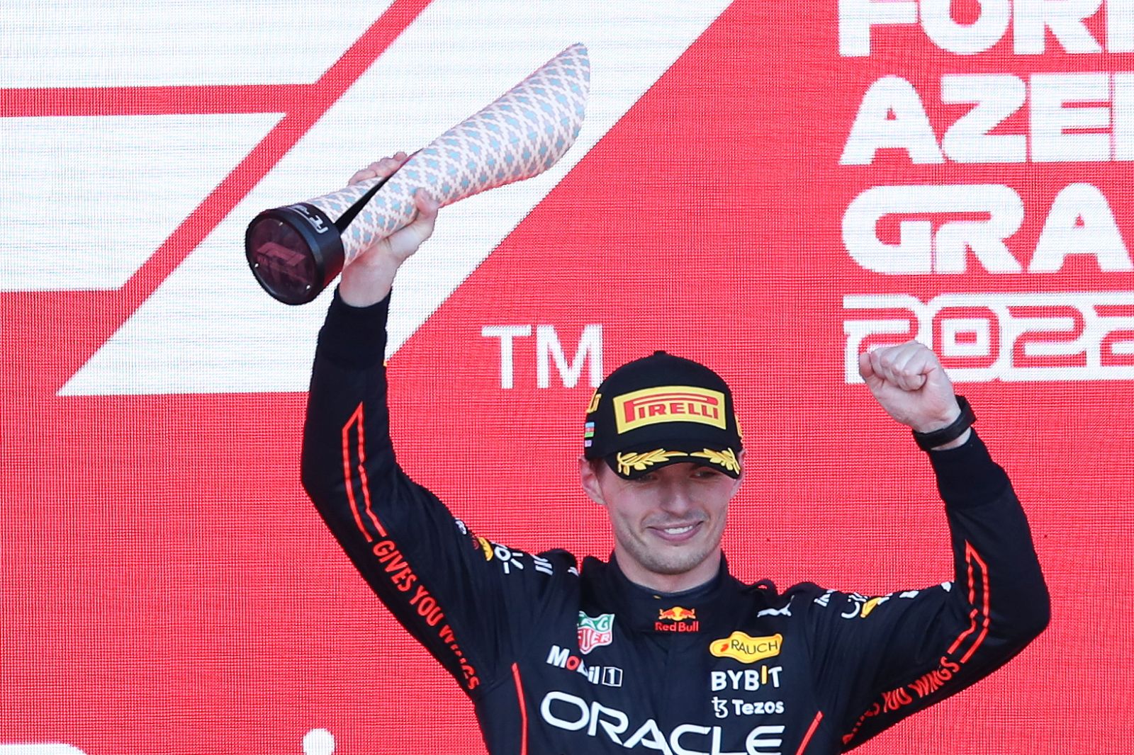 epa10009533 First placed Dutch Formula One driver Max Verstappen of Red Bull Racing celebrates on the podium after the Formula One Grand Prix of Azerbaijan at the Baku City Circuit in Baku, Azerbaijan, 12 June 2022.  EPA/ALI HAIDER