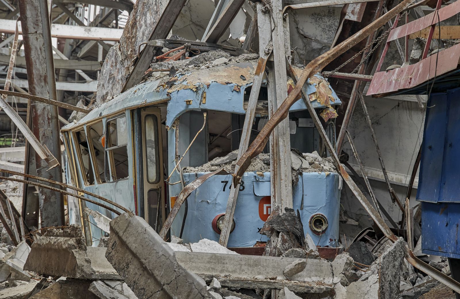 epa10020770 A destroyed tramway depot after recently shelling in Kharkiv, Ukraine, 18 June 2022. Kharkiv, Ukraine's second-largest city, and its surroundings were a center of heavy fightings before the Ukrainian army recaptured the area. On 24 February Russian troops had invaded Ukraine starting a conflict that brought death and destruction and a humanitarian crisis to the country.  EPA/SERGEY KOZLOV