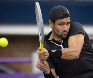 epa10022325 Matteo Berrettini of Italy in action during his final match against Filip Krajinovic of Serbia at the Queen's Club Championships tennis tournament in London, Britain, 19 June 2022.  EPA/TOLGA AKMEN