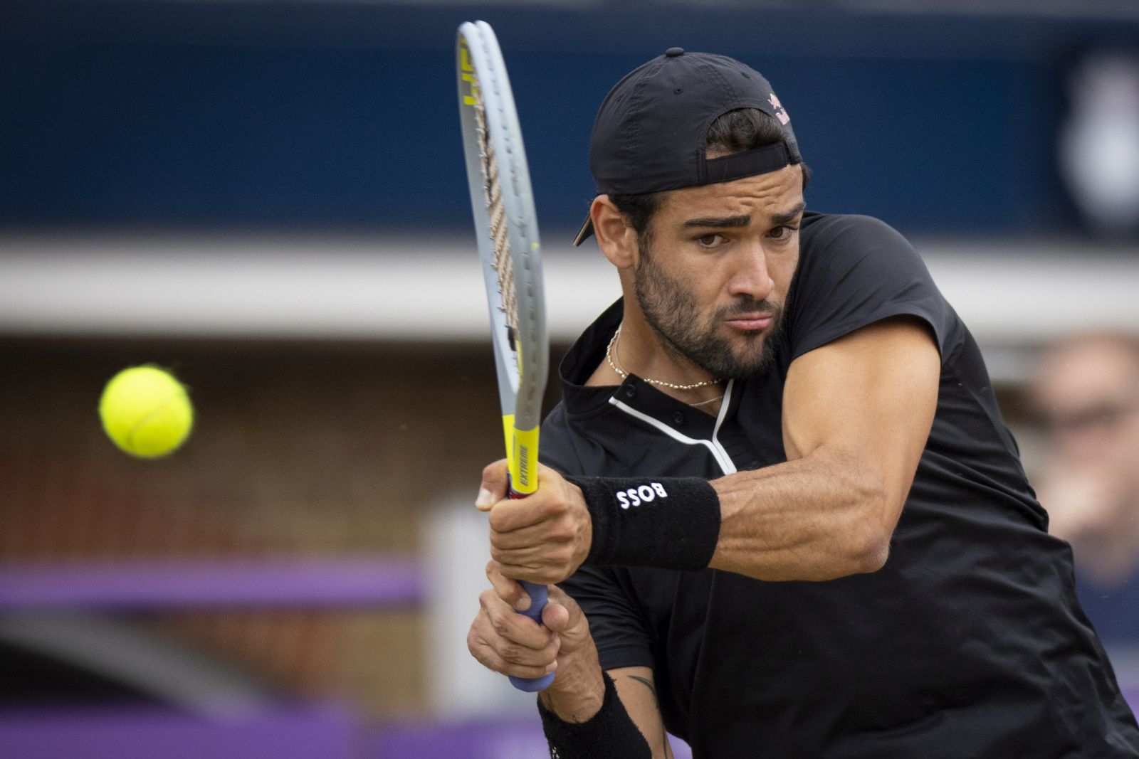 epa10022325 Matteo Berrettini of Italy in action during his final match against Filip Krajinovic of Serbia at the Queen's Club Championships tennis tournament in London, Britain, 19 June 2022.  EPA/TOLGA AKMEN