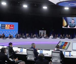 epa10040658 Ukrainian President Volodymyr Zelensky (on screen), delivers a speech as he attends by video conference a meeting during the first day of the NATO Summit at IFEMA Convention Center, in Madrid, Spain, 29 June 2022. Heads of State and Government of NATO's member countries and key partners are gathering in Madrid from 29 to 30 June to discuss security concerns like Russia's invasion of Ukraine and other challenges. Spain is hosting 2022 NATO Summit coinciding with the 40th anniversary of its accession to NATO.  EPA/Juan Carlos Hidalgo