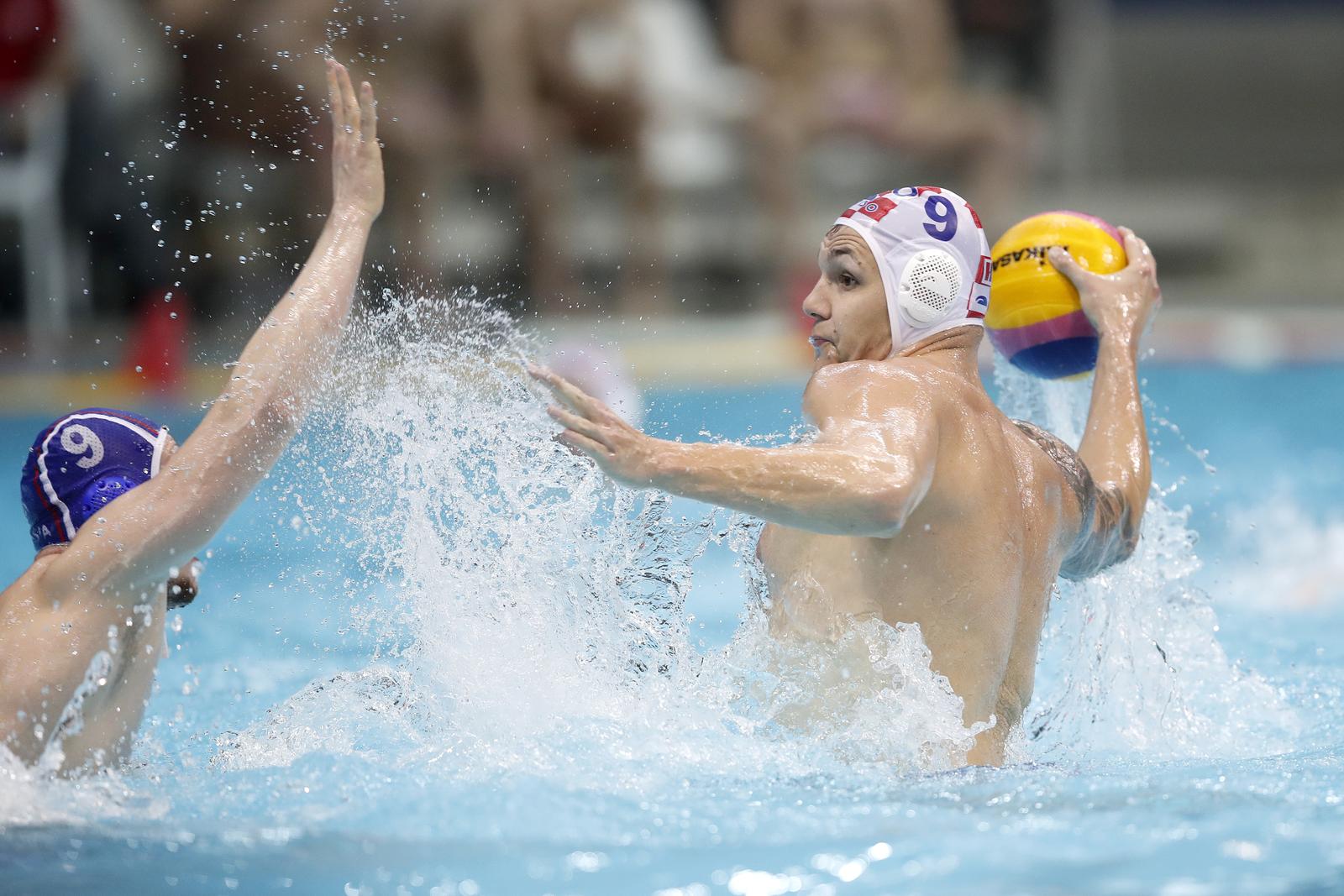 15.02.2022.,  Zagreb, bazen Mladost - Vaterpolo utakmica 2. kola D skupine FINA Svjetske lige Hrvatska - Rusija. Rino Buric, Adel Latypov. Photo: Slavko Midzor/PIXSELL