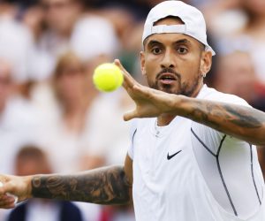 epa10038301 Nick Kyrgios of Australia eyes the ball in the men's first round match against Paul Jubb of Great Britain at the Wimbledon Championships, in Wimbledon, Britain, 28 June 2022.  EPA/TOLGA AKMEN   EDITORIAL USE ONLY