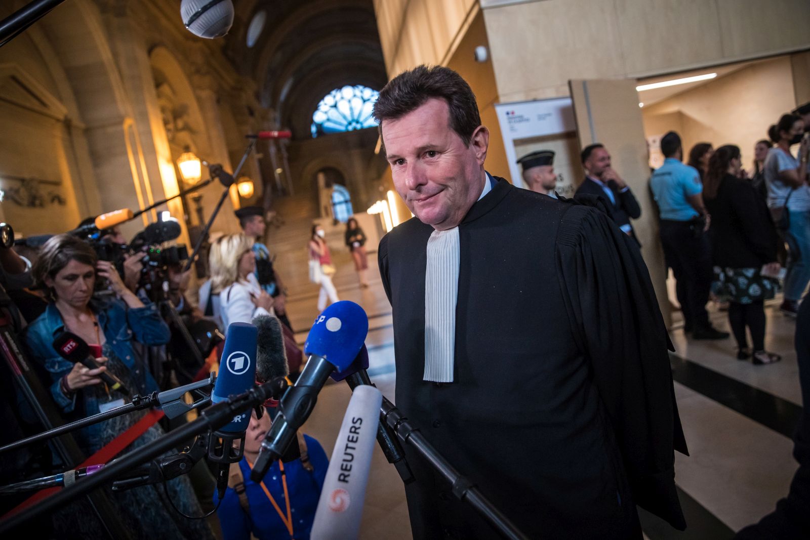 epa10042415 French victims' lawyer Jean Reinhart speaks to media  after the verdict's announcement of the 2015 Paris terrorist attacks, in Paris, France, 29 June 2022. The trial over the 13 November 2015 terrorist attacks began on 08 September 2021. Over 130 people were killed and hundreds injured in a series of coordinated attacks in Paris targeting the Bataclan concert hall, the Stade de France national sports stadium, and several restaurants and bars.  EPA/CHRISTOPHE PETIT TESSON