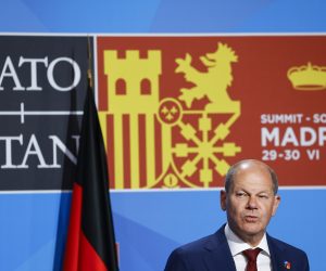 epa10043317 German Chancellor Olaf Scholz addresses a press conference during the second and last day of the NATO Summit at IFEMA Convention Center in Madrid, Spain, 30 June 2022. Heads of State and Government from NATO's member countries and key partners are gathering in Madrid to discuss important issues facing the Alliance and endorse NATO's new Strategic Concept, the Organization said. Spain is hosting the 2022 NATO Summit coinciding with the 40th anniversary of its accession to NATO.  EPA/SERGIO PEREZ