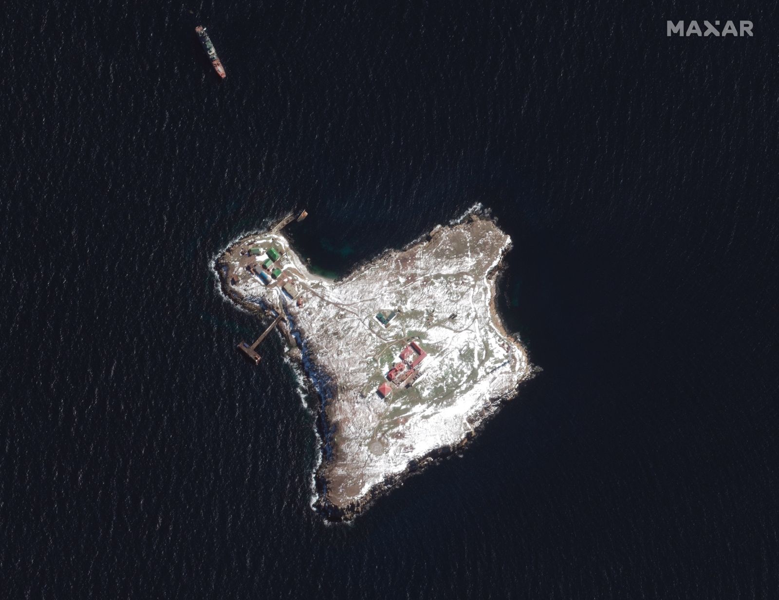 epa10043270 (FILE) - A handout satellite image made available by Maxar Technologies shows a vessel identified by Maxar as a Ropucha-class landing ship off Zmiinyi Island, or Snake Island, in the Black Sea, 13 March 2022 (reissued 30 June 2022). Russian forces withdrew from the Black Sea outpost Snake Island, the Russian Defence Ministry said in a statement on 30 June 2022. On 24 February 2022 Russian troops entered the Ukrainian territory in what the Russian president declared a 'Special Military Operation', starting an armed conflict that has provoked destruction and a humanitarian crisis.  EPA/MAXAR TECHNOLOGIES HANDOUT -- MANDATORY CREDIT: SATELLITE IMAGE 2022 MAXAR TECHNOLOGIES -- THE WATERMARK MAY NOT BE REMOVED/CROPPED -- HANDOUT EDITORIAL USE ONLY/NO SALES HANDOUT EDITORIAL USE ONLY/NO SALES *** Local Caption *** 57548026