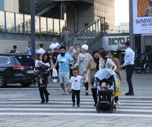 epa10050022 People flee the Fields shopping center during evacuation by armed police, in Oerstad, Copenhagen, Denmark, 03 July 2022. Danish Police has confirmed that shots were fired inside and that several people are injured.  EPA/Olafur Steinar Gestsson  DENMARK OUT