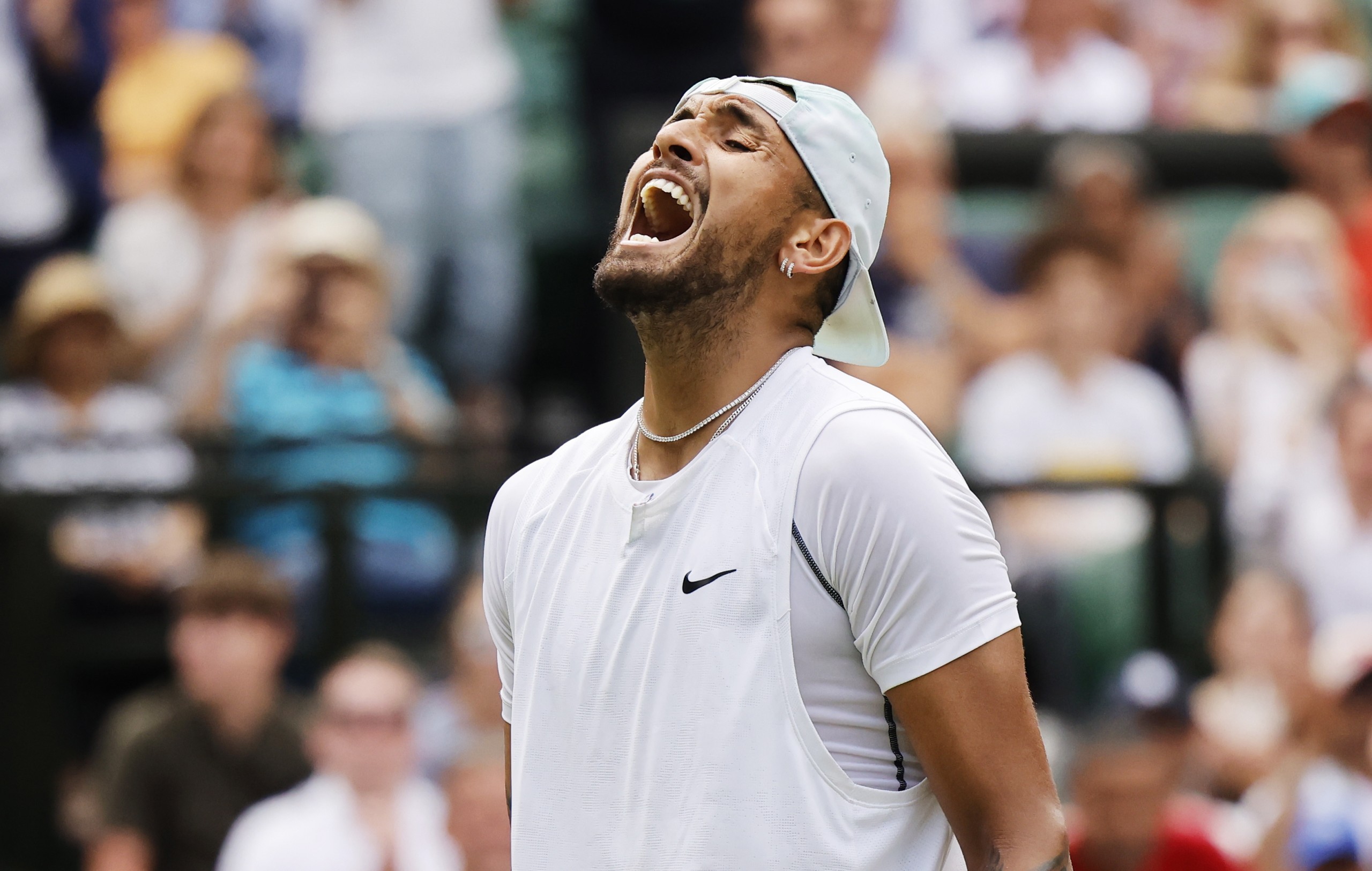 epa10051874 Nick Kyrgios of Australia celebrates winning the men's 4th round match against Brandon Nakashima of the US at the Wimbledon Championships, in Wimbledon, Britain, 04 July 2022.  EPA/TOLGA AKMEN   EDITORIAL USE ONLY