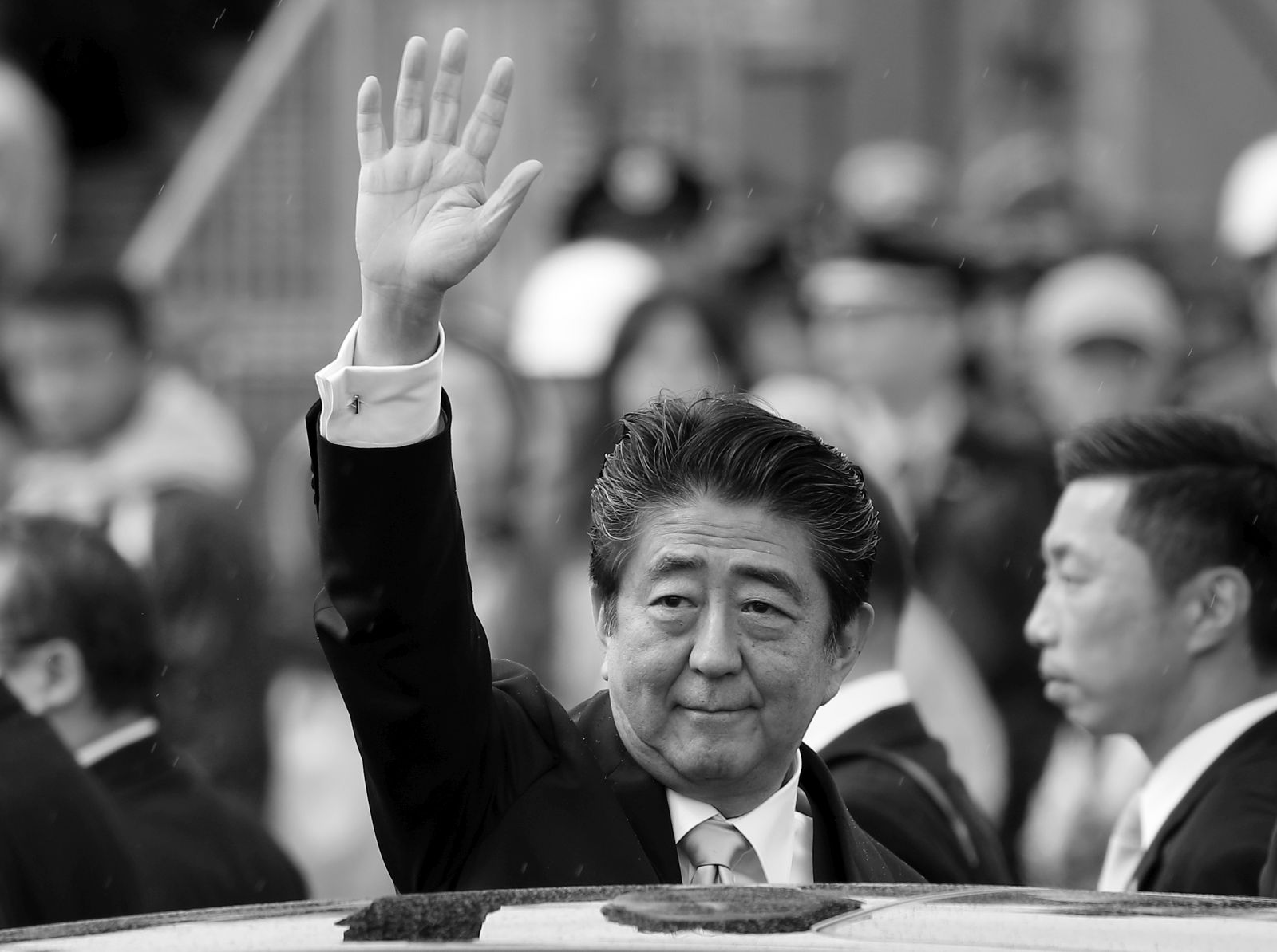 epa10058750 (FILE) - Japanese Prime Minister Shinzo Abe waves as he leaves the Ground Self Defense Force's Asaka training ground after reviewing troops in Asaka, near Tokyo, Japan, 14 October 2018 (reissued 08 July 2022). According to Japan's national broadcaster, former Prime Minister Shinzo Abe died of his injuries on 08 July 2022, hours after being shot during an Upper House election campaign act to support a party candidate, outside a railway station in Nara, western Japan. He was 67. Abe had served as Japan's prime minister from 2006 to 2007 and again from 2012 to 2020. He was the longest-serving prime minister in the history of the country.  EPA/FRANCK ROBICHON *** Local Caption *** 54699196