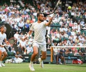 epa10062398 Croatia's Mate Pavic (R) and Croatia's Nikola Mektic (L) in action during the men's doubles final tennis match against Australia's Matthew Ebden and Australia's Max Purcell at the Wimbledon Championships, in Wimbledon, Britain, 09 July 2022.  EPA/NEIL HALL   EDITORIAL USE ONLY