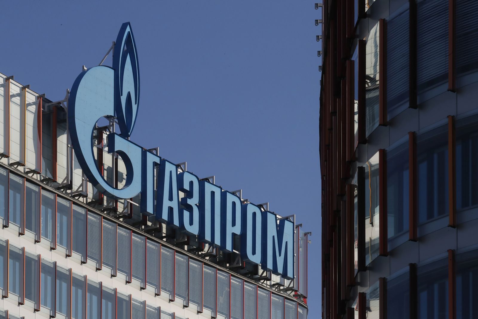 epa10083540 A Gazprom office in St. Petersburg, Russia, 21 July 2022. Gas deliveries through Russia-Germany pipeline Nord Stream 1 resumed on 21 July following a scheduled 10-days maintenance pause.  EPA/ANATOLY MALTSEV
