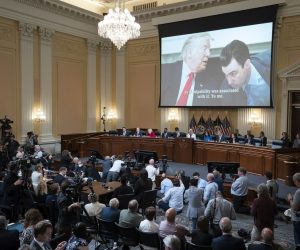 epa10085837 A video of a photograph of President Donald Trump (L), and aid Nick Luna, is shown on a screen,, as the House select committee investigating the January 6 attack on the US Capitol holds a hearing, at the Capitol, in Washington, DC, USA, 21 July 2022.  EPA/Alex Brandon / POOL