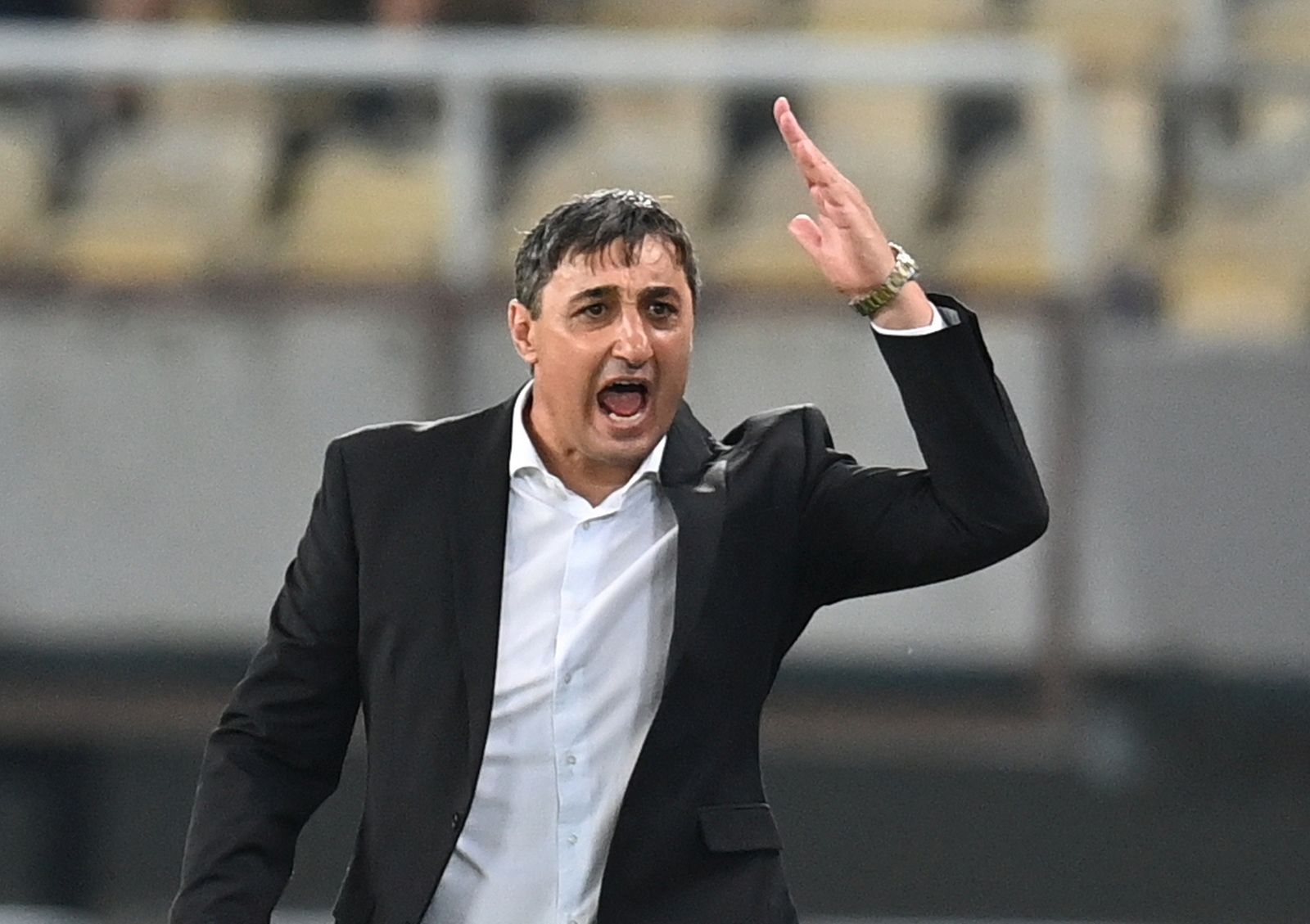 epa10092879 Shkupi's coach Goce Sedloski reacts during the UEFA Champions League second qualifying round, second leg match between Shkupi and Dinamo Zagreb in Skopje, Republic of North Macedonia, 26 July 2022.  EPA/GEORGI LICOVSKI