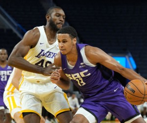 Jul 5, 2022; San Francisco, CA, USA; Sacramento Kings forward Keegan Murray (13) dribbles against Los Angeles Lakers forward Vitto Brown (48) during the third quarter at the California Summer League at Chase Center. Mandatory Credit: Darren Yamashita-USA TODAY Sports Photo: Darren Yamashita/REUTERS