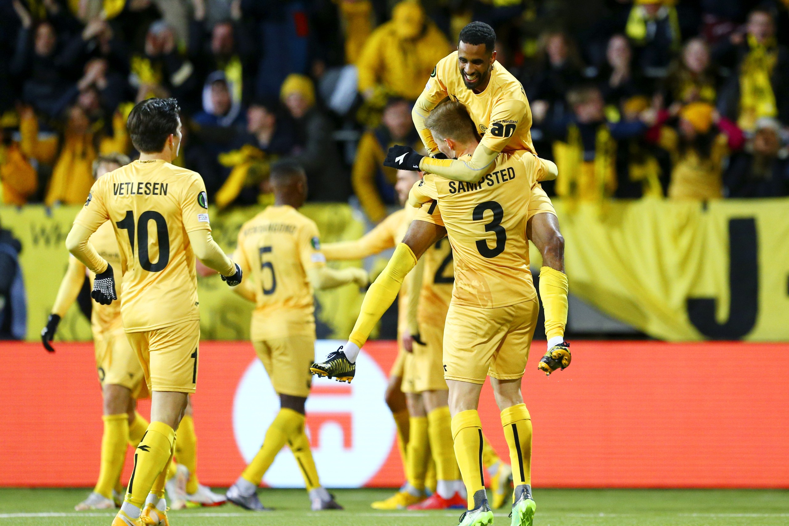 Bodo Glimt players celebrate Amahl Pellegrino's goal during the Europa Conference League soccer match between Bodo Glimt and AZ Alkmaar at Aspmyra stadium, Bodo, Norway, Thursday March 10, 2022. (Mats Torbergsen/NTB via AP)
