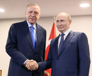 epa10080223 Turkish President Recep Tayyip Erdogan (L) and Russian President Vladimir Putin (R) shake hands during a meeting in Tehran, Iran, 19 July 2022. Russian President is on a working visit in Iran to take part in a summit grouping leaders of Iran, Turkey, and Russia and to have bilateral meetings with the leaders of Iran and Turkey.  EPA/SERGEI SAVOSTYANOV / KREMLIN POOL / SPUTNIK / POOL MANDATORY CREDIT