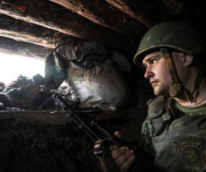 epa10082655 Self-proclaimed Donetsk People's Republic (DPR) militia monitors a section of the road near Avdiivka, Donetsk region, eastern Ukraine, 20 July 2022. On 24 February 2022 Russian troops entered the Ukrainian territory in what the Russian president declared a 'Special Military Operation', starting an armed conflict that has provoked destruction and a humanitarian crisis.  EPA/ALESSANDRO GUERRA