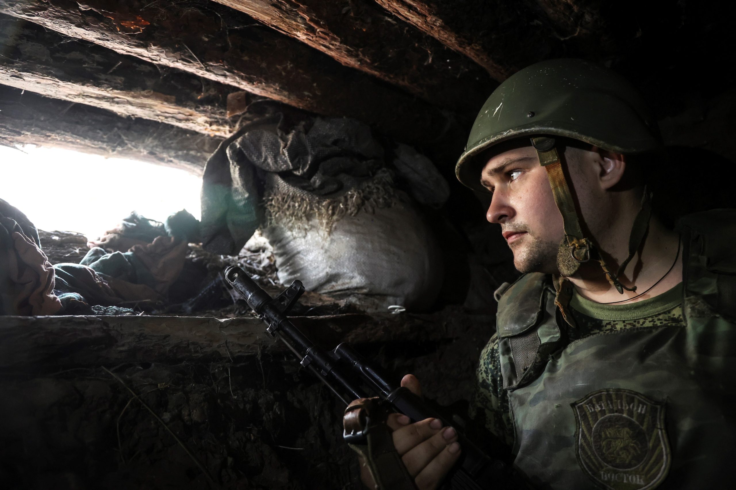 epa10082655 Self-proclaimed Donetsk People's Republic (DPR) militia monitors a section of the road near Avdiivka, Donetsk region, eastern Ukraine, 20 July 2022. On 24 February 2022 Russian troops entered the Ukrainian territory in what the Russian president declared a 'Special Military Operation', starting an armed conflict that has provoked destruction and a humanitarian crisis.  EPA/ALESSANDRO GUERRA
