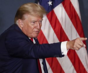 epa10093201 Former US President Donald J. Trump gestures as he walks off the stage following his remarks, during the America First Policy Institute’s America First Agenda Summit, in Washington, DC, USA, 26 July 2022. The speech is former President Trump’s first appearance in Washington since leaving office.  EPA/SHAWN THEW