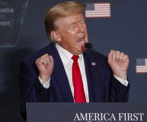 epaselect epa10093199 Former US President Donald J. Trump mimics a female weight lifter as he delivers remarks, during the America First Policy Institute’s America First Agenda Summit, in Washington, DC, USA, 26 July 2022. The speech is former President Trump’s first appearance in Washington since leaving office.  EPA/SHAWN THEW