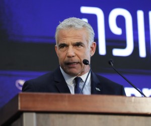 epa10095196 Israeli Prime Minister Yair Lapid speaks during an inauguration ceremony for a new emergency room at the Ichilov Hospital in Tel Aviv, Israel, 28 July 2022.  EPA/ABIR SULTAN