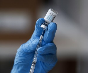epa10104694 Healthcare worker Gizelle Mendoza prepares a syringe with a dose of the Monkeypox vaccine, at a vaccination clinic at the West Hollywood Library, in West Hollywood, California, USA, 03 August 2022. Pop-up vaccination clinics have emerged across Los Angeles County, making vaccinations availble only for specific risk groups while supplies are limited.  EPA/CAROLINE BREHMAN