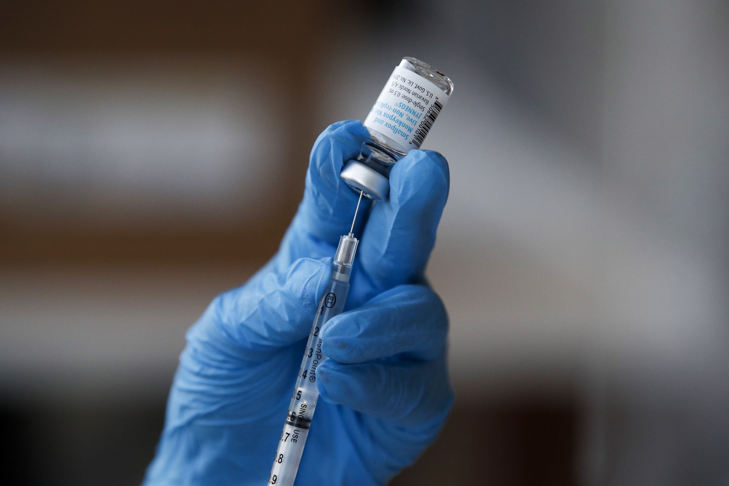 epa10104694 Healthcare worker Gizelle Mendoza prepares a syringe with a dose of the Monkeypox vaccine, at a vaccination clinic at the West Hollywood Library, in West Hollywood, California, USA, 03 August 2022. Pop-up vaccination clinics have emerged across Los Angeles County, making vaccinations availble only for specific risk groups while supplies are limited.  EPA/CAROLINE BREHMAN