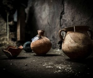 epa10108462 Amphorae and furnishings, found in the house of the 'enchanted garden' in Pompeii, Italy, 06 August 2022. The house of the middle class contains five small rooms plus bathroom and kitchen overlooking a beautiful garden.  EPA/Cesare Abbate