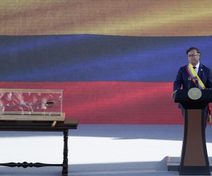 epa10110791 Colombian President Gustavo Petro, with Bolivar's sword next to him, delivers his investiture speech in the Plaza Bolivar in Bogota, Colombia, 07 August 2022. Thousands of people gathered in the entrenched streets of the center of the Colombian capital to access the Plaza Simon Bolivar where the investiture ceremony takes place with the desire not to miss the historical moment that the country will experience: the possession of the first left-wing government in the history of the country.  EPA/Carlos Ortega