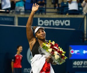 epa10115043 Serena Williams of the US acknowledges the crowd after her match against Belinda Bencic of Switzerland, during the second round of the National Bank Open women's tennis tournament, in Toronto, Canada, 10 August 2022.  EPA/EDUARDO LIMA