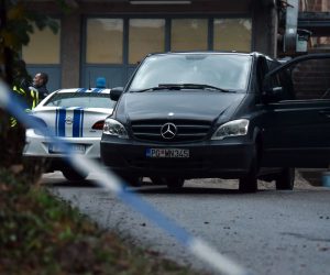 epa10117915 Police officers close off the crime scene at Cetinje, Montenegro, 12 August 2022. A 34 year old male in Montenegro went on a shooting rampage after a family dispute, killing at least 10 people on the street before being gunned down in an exchange of fire with the police.  EPA/BORIS PEJOVIC
