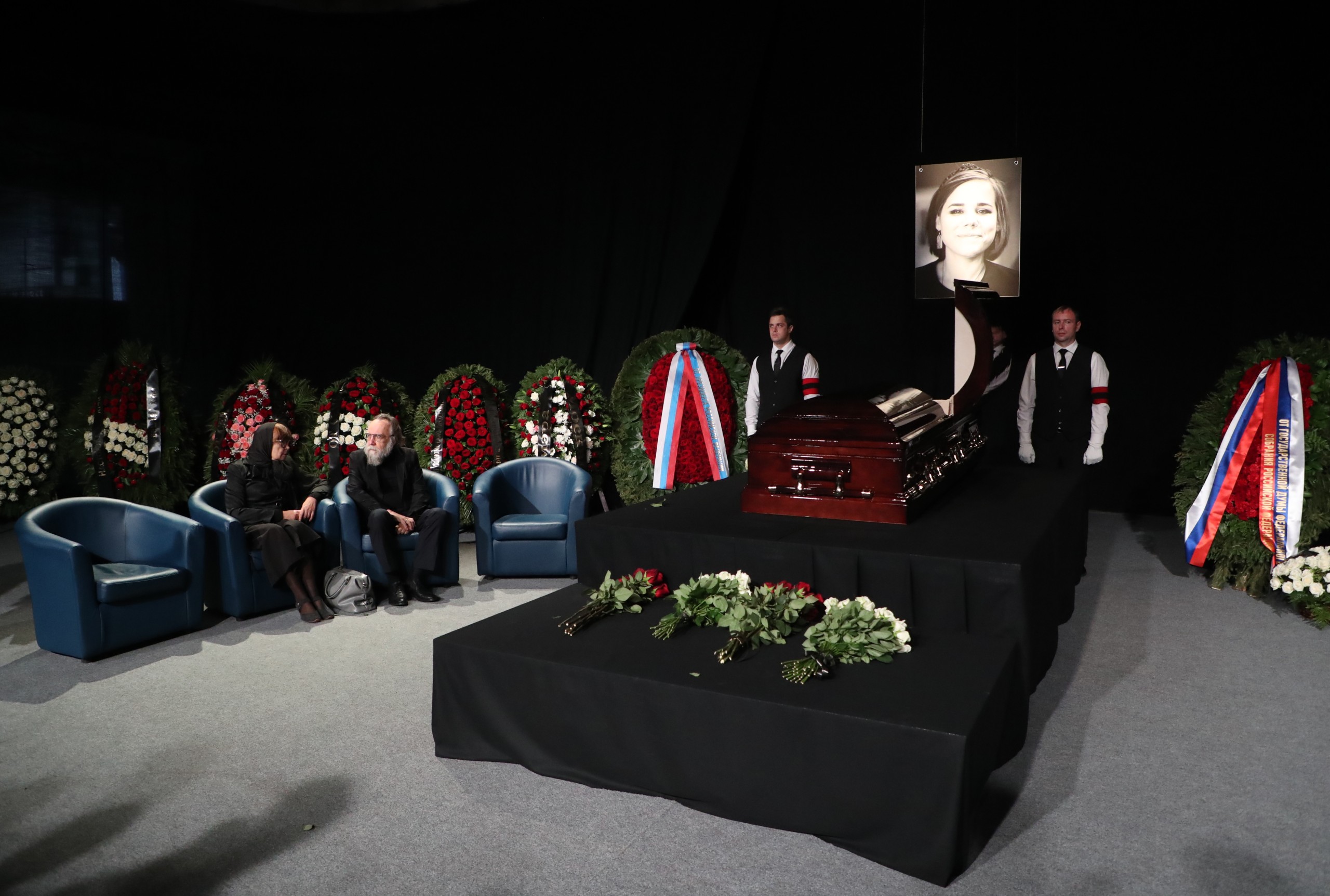 epa10134279 Russian political philosopher Alexander Dugin (2-L), leader of the International Eurasian Movement, attends a mourning ceremony for his daughter, Russian journalist and political scientist Darya Dugina (Platonova), at the Ostankino Television Technical Center in Moscow, Russia, 23 August 2022. Dugina, 29, died on 20 August when the car she was driving blew up on a highway near Moscow.  EPA/MAXIM SHIPENKOV