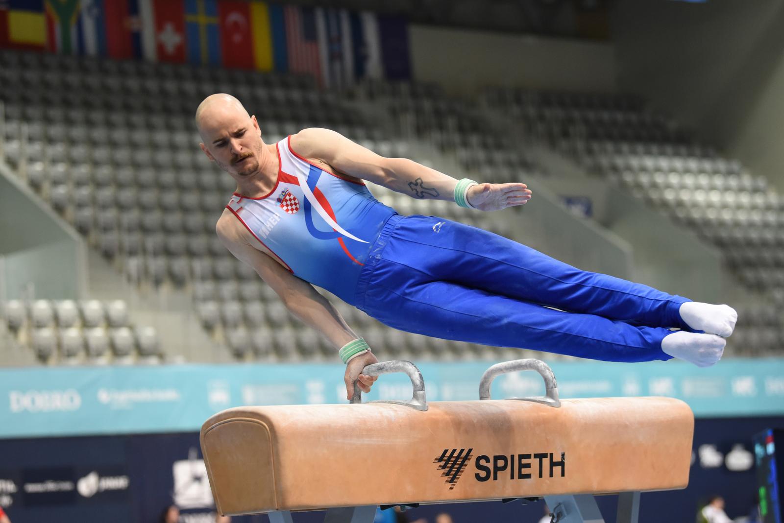 09.06.2022., Osijek - Prvi dan gimnasticarskog natjecanja DOBRO World CUP Osijek 2022. u sportskoj dvorani Gradski vrt. Kvalifikacije, konj s hvataljkama. Filip Ude Photo: Dubravka Petric/PIXSELL