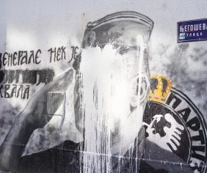 10, November, 2021, Belgrade - A bucket of lime was thrown on the mural with the image of Ratko Mladic, and behind it stands Djordjo Zujovic, a longtime activist and member of the Social Democratic Party of Serbia.   10, novembar, 2021, Beograd  - Na mural sa likom Ratka Mladica bacena je kofa kreca, a iza toga stoji Djordjo Zujovic, dugogodisnji aktivista i clan Socijaldemokratske partije Srbije.  Photo: Antonio Ahel/PIXSELL