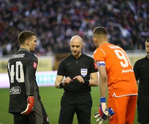 12.03.2022., stadion Poljud, Split - Hrvatski Telekom Prva liga, 27. kolo, HNK Hajduk - GNK Dinamo. Dominik Livakovic, sudac Dario Bel, Lovre Kalinic  Photo: Ivo Cagalj/PIXSELL