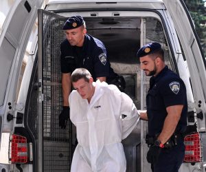 26.08.2022., Zadar - Privodjenje Duska Tanaskovica koji je osumnjiceni za likvidaciju Gorana Vlaovica jucer ispred kluba ‘Noa‘ na plazi Katarelac. Tanaskovic je doveden u Zupanijsko drzavno odvjetnistvo u Zadru uz osiguranje pripadnika interventne policije s dugim cijevima. Photo: Dino Stanin/PIXSELL
