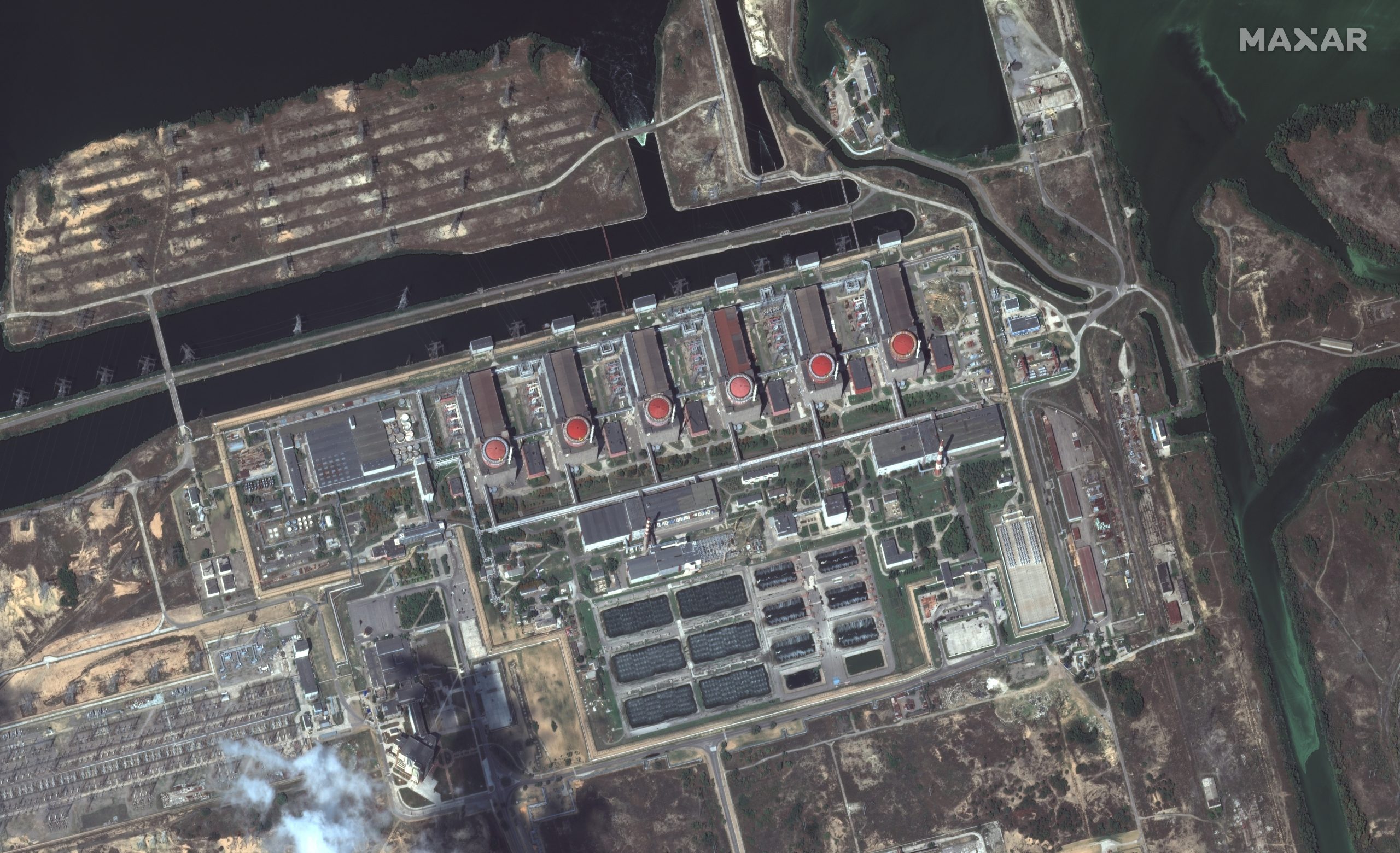 epa10129321 A handout photo made available by Maxar Technologies of the Zaporizhzhia nuclear power plant facility in Enerhodar, Ukraine, 19 August 2022. No significant signs of recent shelling or damage was seen in or around the nuclear plant.  EPA/MAXAR TECHNOLOGIES HANDOUT HANDOUT -- MANDATORY CREDIT: SATELLITE IMAGE 2022 MAXAR TECHNOLOGIES -- THE WATERMARK MAY NOT BE REMOVED/CROPPED -- HANDOUT EDITORIAL USE ONLY/NO SALES