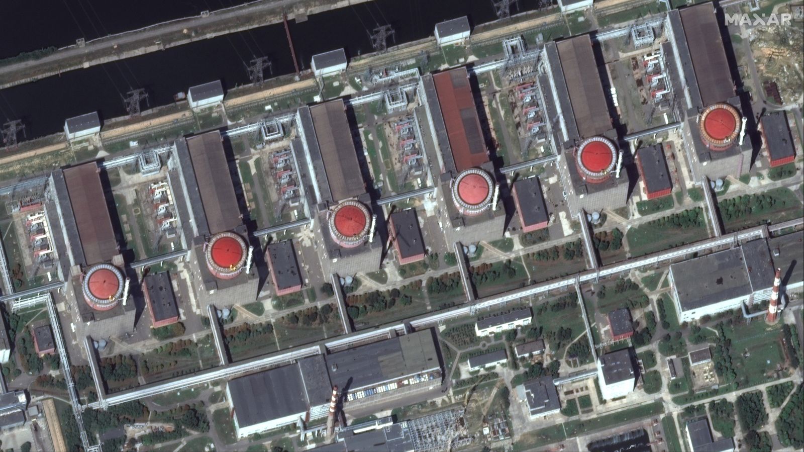 epa10129320 A handout photo made available by Maxar Technologies of the Zaporizhzhia nuclear power plant facility in Enerhodar, Ukraine, 19 August 2022. No significant signs of recent shelling or damage was seen in or around the nuclear plant.  EPA/MAXAR TECHNOLOGIES HANDOUT HANDOUT -- MANDATORY CREDIT: SATELLITE IMAGE 2022 MAXAR TECHNOLOGIES -- THE WATERMARK MAY NOT BE REMOVED/CROPPED -- HANDOUT EDITORIAL USE ONLY/NO SALES