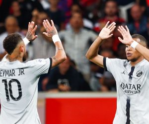 epa10132929 Paris Saint Germain's Kylian Mbappe and Paris Saint Germain's Neymar Jr (L)  celebrate after scoring the 7-1 goal during the French Ligue 1 soccer match between Lille and PSG in Lille, France, 21 August 2022.  EPA/Mohammed Badra