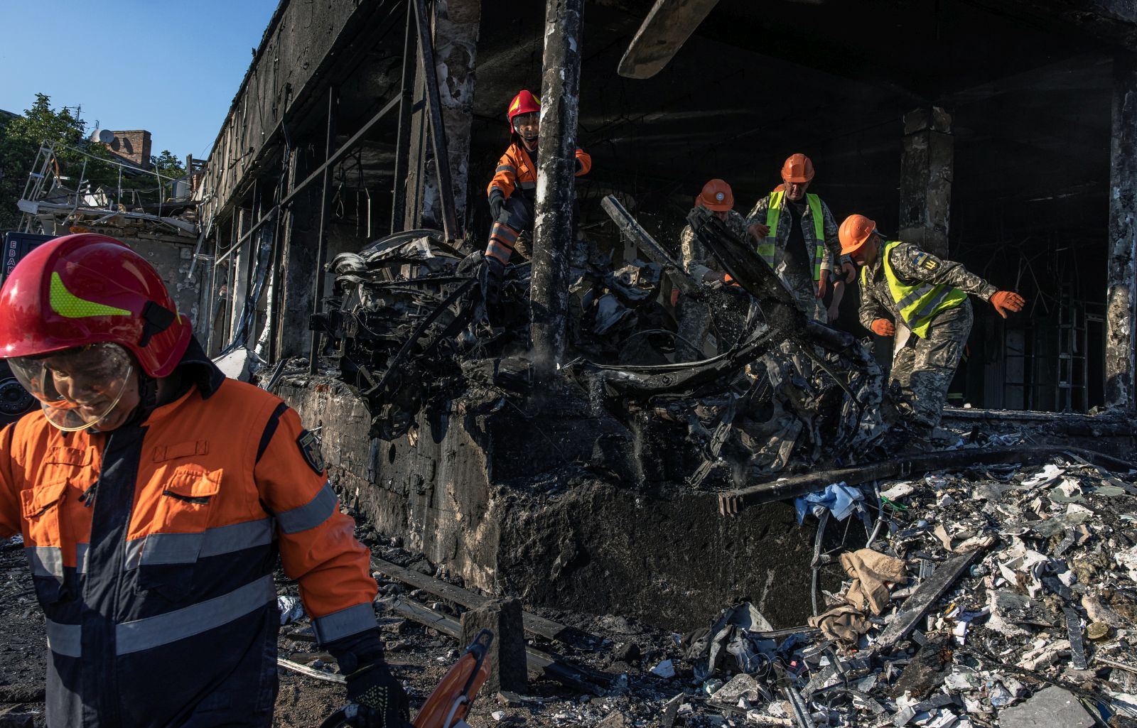 epa10134553 (FILE) - Ukrainian emergency workers and military work at the site of the Russian missile strike in downtown Vinnytsia, west-central Ukraine, 14 July 2022.(Issued 23 August 2022). Ukraine marks, on 24 August 2022, six months since the war with Russia started.  EPA/ROMAN PILIPEY  ATTENTION: This Image is part of a PHOTO SET