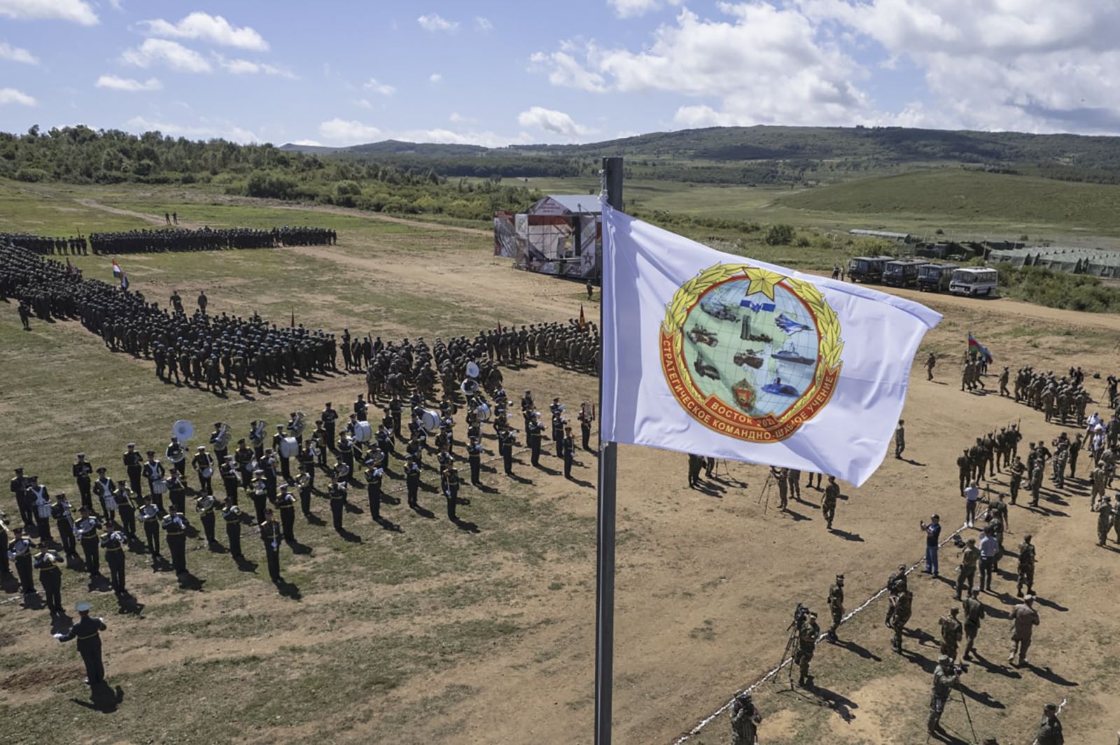 epa10149762 A handout image made available 31 August 2022 by the press service of the Russian Defence Ministry shows servicemen from 14 countries march during  opening ceremony of the Vostok 2022 strategic command and staff exercise at the Sergeyevsky training ground in the Primorsky territory in the Russian Far East, Russia, The Vostok 2022 strategic command and staff exercise will take place from 01 to 07 September 2022 and will involve over 50,000 servicemen and more than 5,000 units of weapons and military equipment.  EPA/RUSSIAN DEFENCE MINISTRY PRESS SERVICE/HANDOUT HANDOUT  HANDOUT EDITORIAL USE ONLY/NO SALES