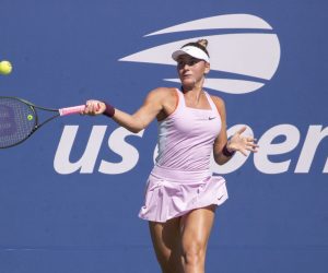 epa10152846 Marta Kostyuk of Ukraine hits a return to Victoria Azarenka of Belarus during the US Open Tennis Championships at the USTA National Tennis Center in the Flushing Meadows, New York, USA, 01 September 2022. The US Open runs from 29 August through 11 September.  EPA/SARAH YENESEL