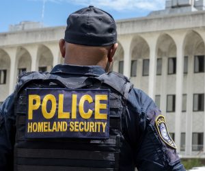 epa10153017 A police officer stands in front of the Paul G. Rogers Federal Courthouse in West Palm Beach, Florida, USA, 01 September 2022. The US Department of Justice revealed that in August the FBI seized more than 100 classified documents from former President Donald Trump's Mar-a-Lago residence and advised a judge to reject Trump's request to have those records reviewed by a special master.  EPA/CRISTOBAL HERRERA-ULASHKEVICH