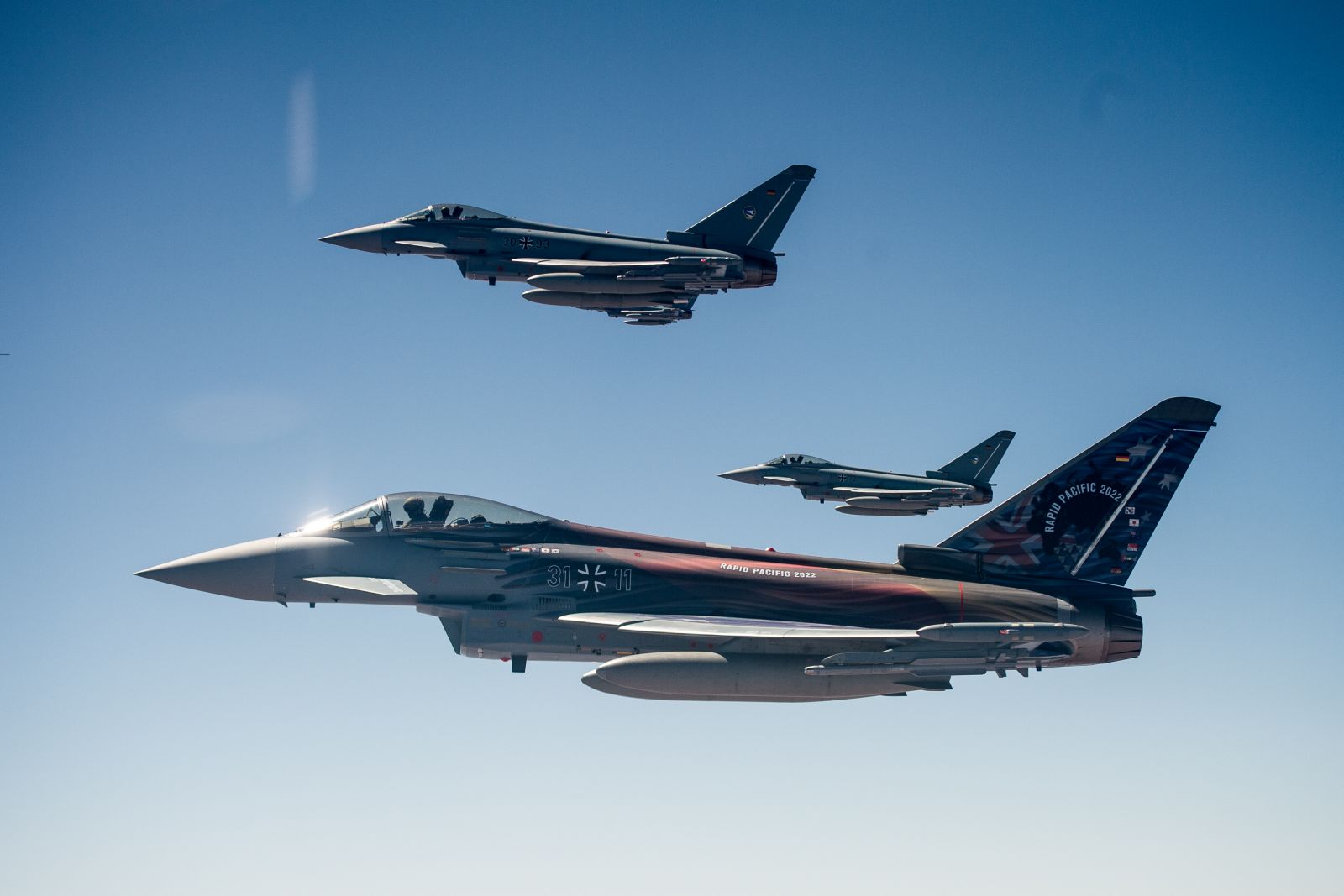 epa10156118 Three German Luftwaffe's Eurofighter Typhoon aircraft flies alongside a Multinational Multi Role Tanker Transport Airbus A330, during the Australian Defence Force’s Exercise Pitch Black in the skies above the Northern Territory, Australia, 02 September 2022. The NATO-nation flown air-to-air refueller has come to the Top End to train with 100 other military aircraft from 17 nations to increase interoperability.  EPA/AARON BUNCH   AUSTRALIA AND NEW ZEALAND OUT