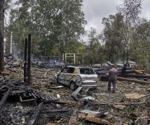 epa10158885 A communal worker inspects a site after a Russian rocket attack hit a restaurant complex in Kharkiv, Ukraine, 04 September 2022. Two main buildings and a summer pavilion on a total area of ??2,200 square meters were burned, according to the State Emergency Services. Kharkiv and surrounding areas have been the target of heavy shelling since February 2022, when Russian troops entered Ukraine starting a conflict that has provoked destruction and a humanitarian crisis.  EPA/SERGEY KOZLOV