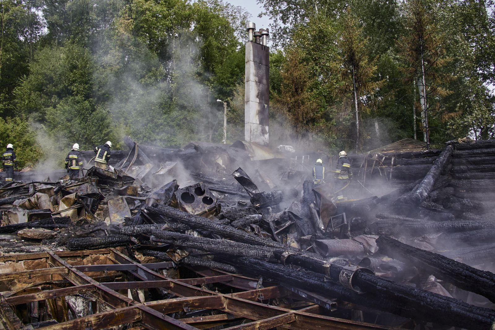 epa10158883 Firefighters extinguish a fire after a Russian rocket attack hit a restaurant complex in Kharkiv, Ukraine, 04 September 2022. Two main buildings and a summer pavilion on a total area of ??2,200 square meters were burned, according to the State Emergency Services. Kharkiv and surrounding areas have been the target of heavy shelling since February 2022, when Russian troops entered Ukraine starting a conflict that has provoked destruction and a humanitarian crisis.  EPA/SERGEY KOZLOV