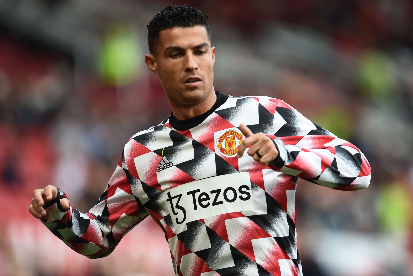 epa10159533 Manchester United's Cristiano Ronaldo before the English Premier League soccer match between Manchester United and Arsenal at Old Trafford in Manchester, Britain, 04 September 2022.  EPA/PETER POWELL EDITORIAL USE ONLY. No use with unauthorized audio, video, data, fixture lists, club/league logos or 'live' services. Online in-match use limited to 120 images, no video emulation. No use in betting, games or single club/league/player publications